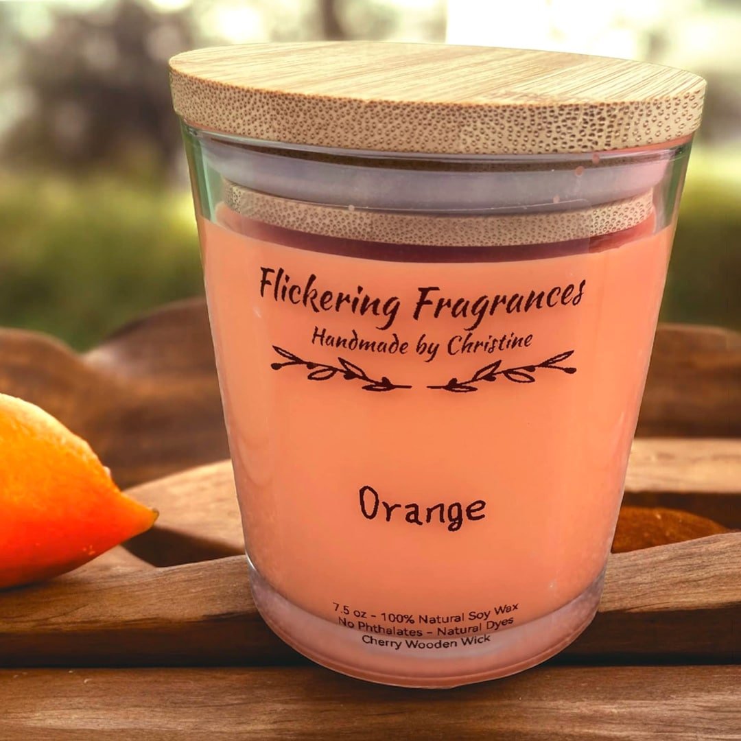 Orange handmade soy candle by Flickering Fragrances